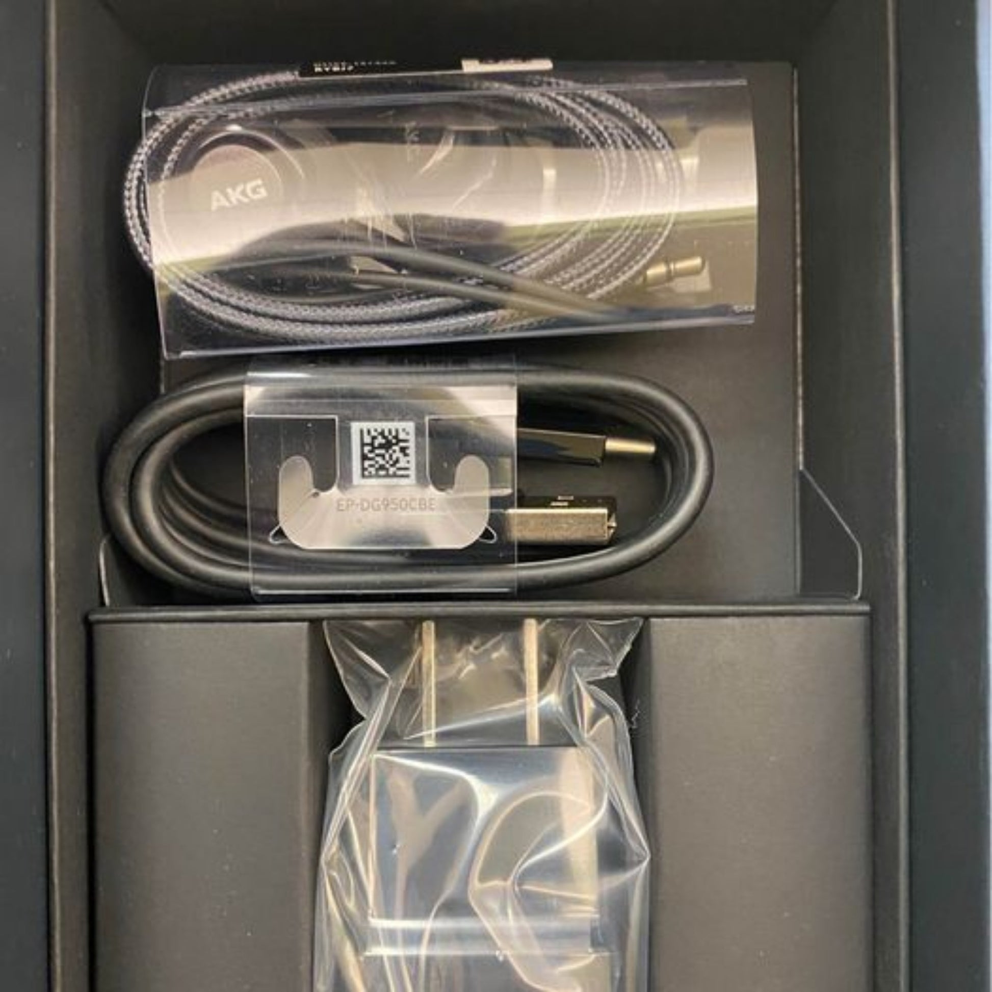 Samsung Galaxy Note 9 charger, earbuds and adapter pre-packaged